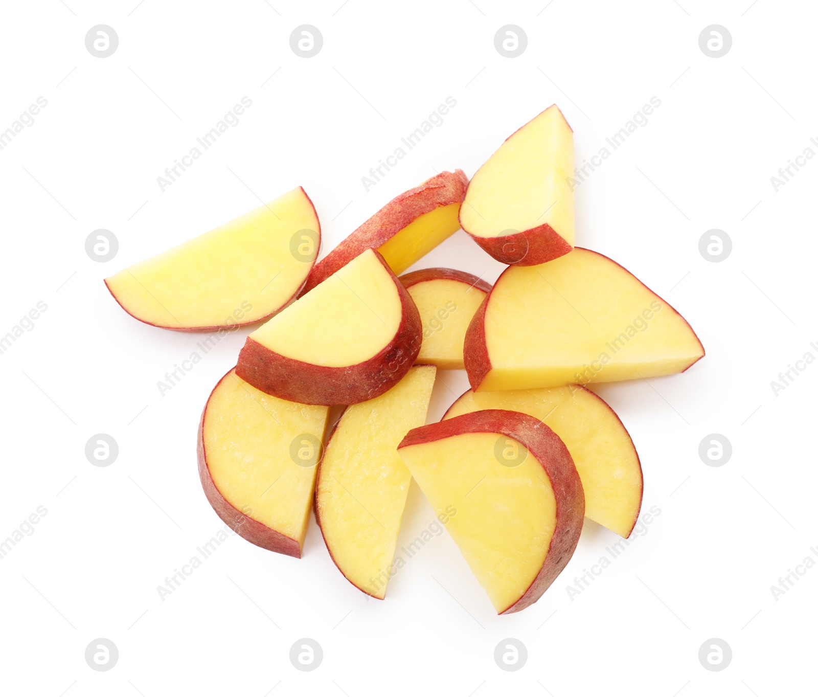 Pieces of fresh red potatoes isolated on white, top view Photo of Pieces of fresh red potatoes isolated on white, top view