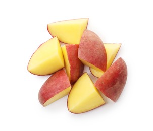 Photo of Pieces of fresh red potatoes isolated on white, top view
