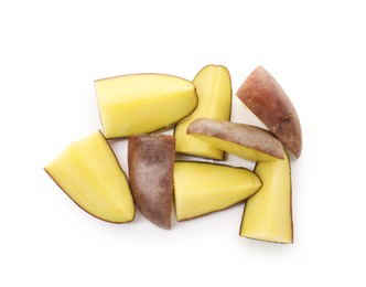 Photo of Pieces of fresh potatoes isolated on white, top view