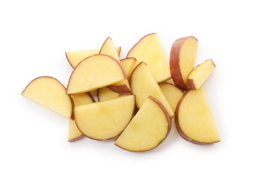 Photo of Pieces of fresh red potatoes isolated on white, top view