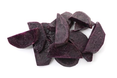 Photo of Pieces of fresh purple potato isolated on white, top view