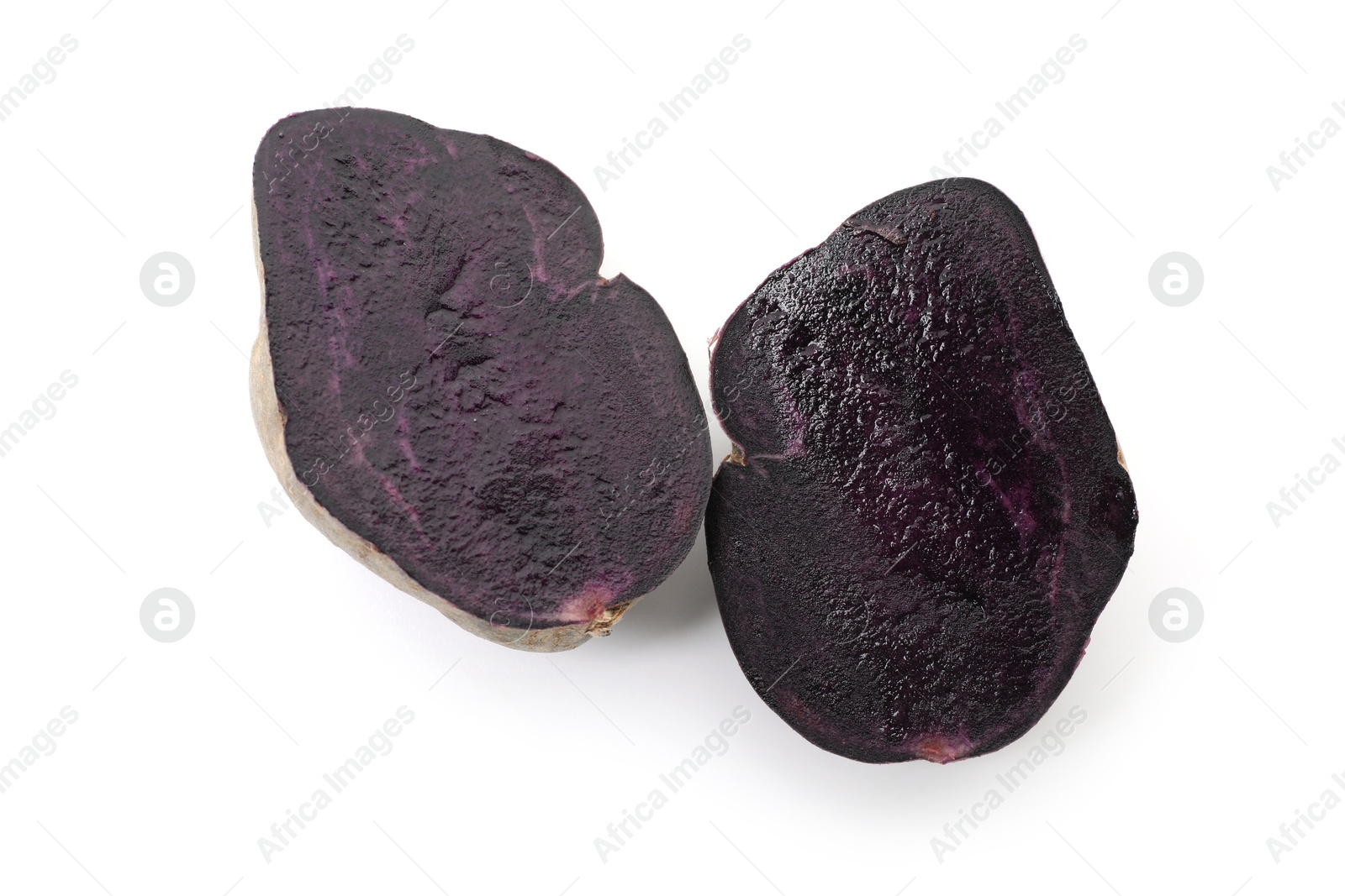 Photo of Cut fresh purple potato isolated on white, top view
