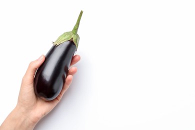 Photo of Woman with fresh eggplant on white background, top view. Space for text