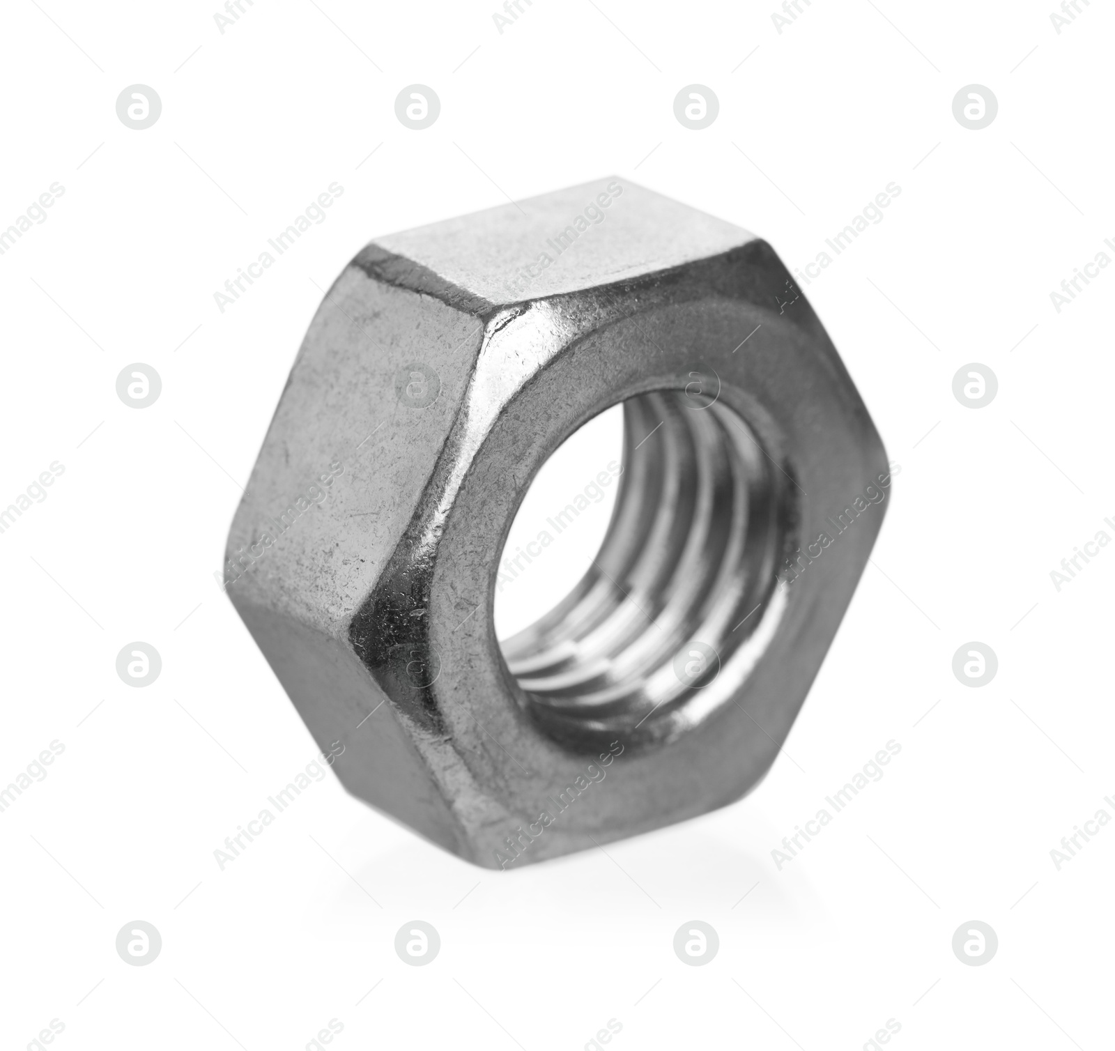 Photo of One metal hex nut isolated on white. Hardware tool