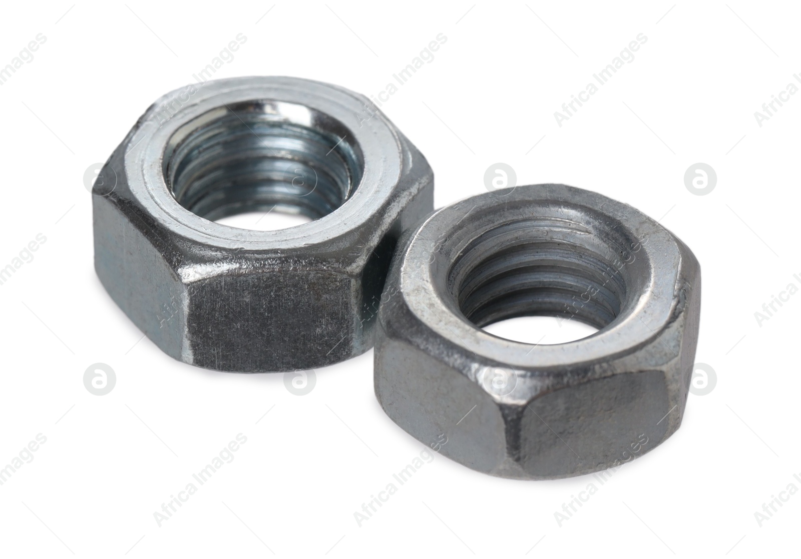 Photo of Metal hex nuts isolated on white. Hardware tool