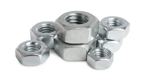 Photo of Metal hex nuts isolated on white. Hardware tool