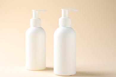 Photo of Promotion. Cosmetic products on beige background, closeup