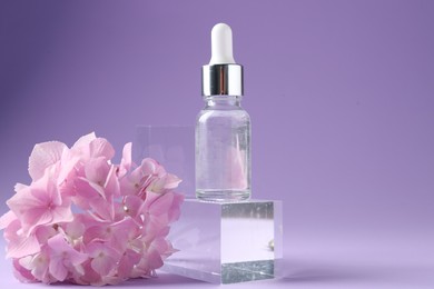 Photo of Promotion. Bottle of cosmetic product, glass podium and hydrangea flowers on violet background, closeup