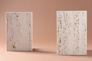 Photo of Promotion. Podiums for product presentation on brown background, space for text