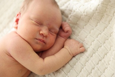 Photo of Cute newborn baby sleeping on bed indoors