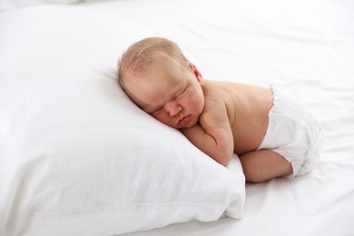 Photo of Cute newborn baby sleeping on bed indoors