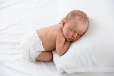 Photo of Cute newborn baby sleeping on bed indoors