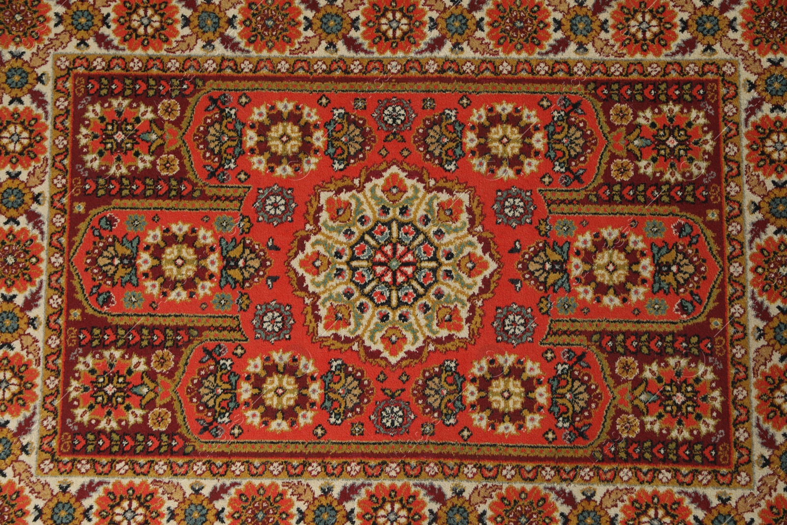 Soft red carpet with pattern as background, top view. Used stuff Photo of Soft red carpet with pattern as background, top view. Used stuff
