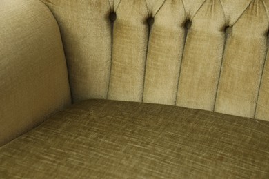 Photo of Soft sofa as background, closeup. Used stuff