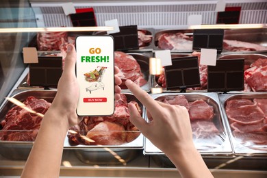 Image of Food delivery. Man using mobile phone app to order grocery online, closeup
