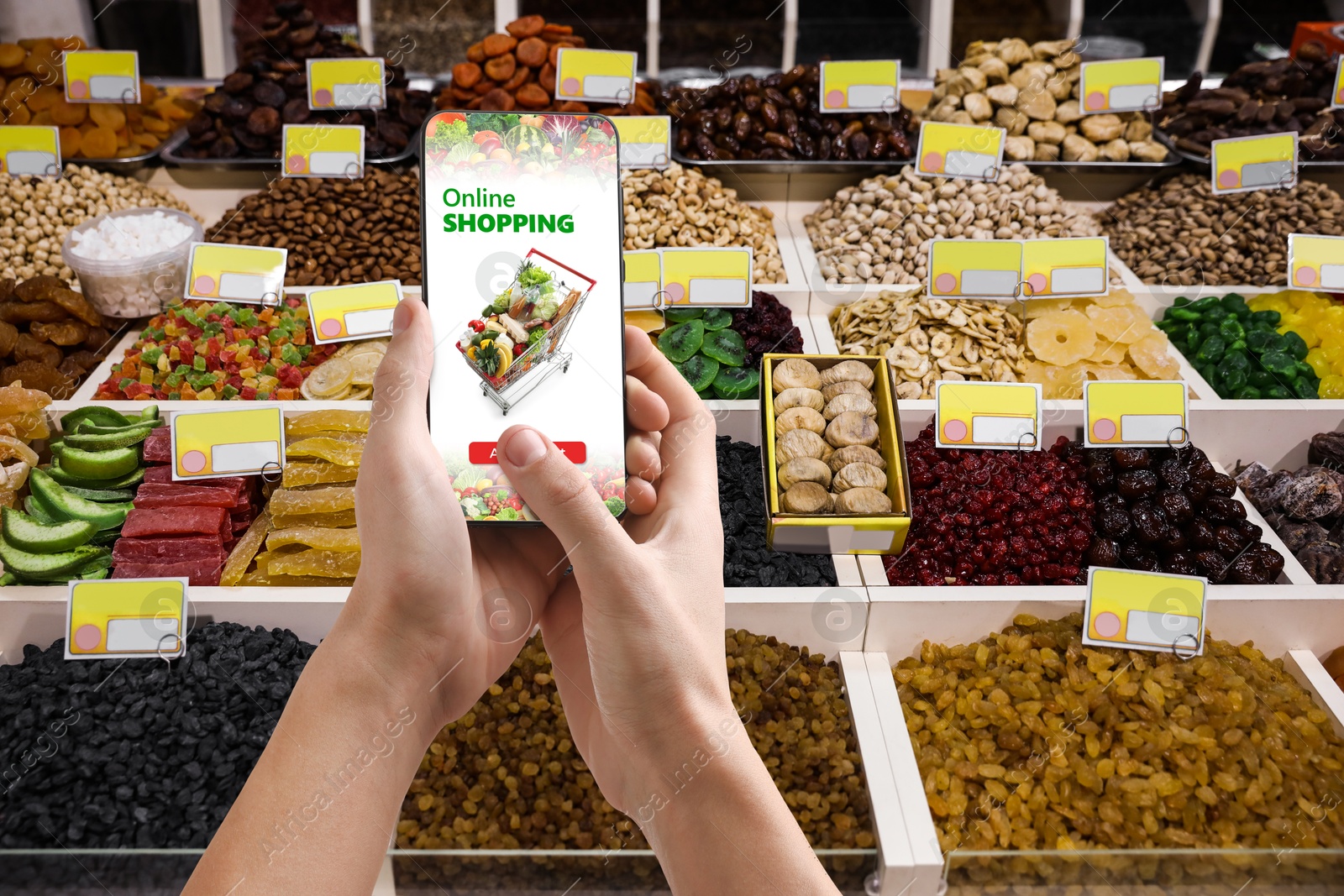Food delivery. Man using mobile phone app to order grocery online, closeup Image of Food delivery. Man using mobile phone app to order grocery online, closeup