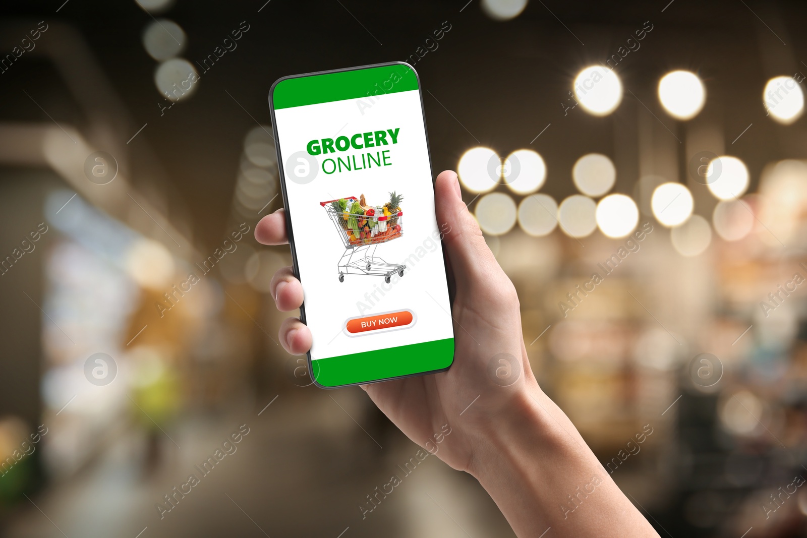 Food delivery. Man using mobile phone app to order grocery online, closeup Image of Food delivery. Man using mobile phone app to order grocery online, closeup
