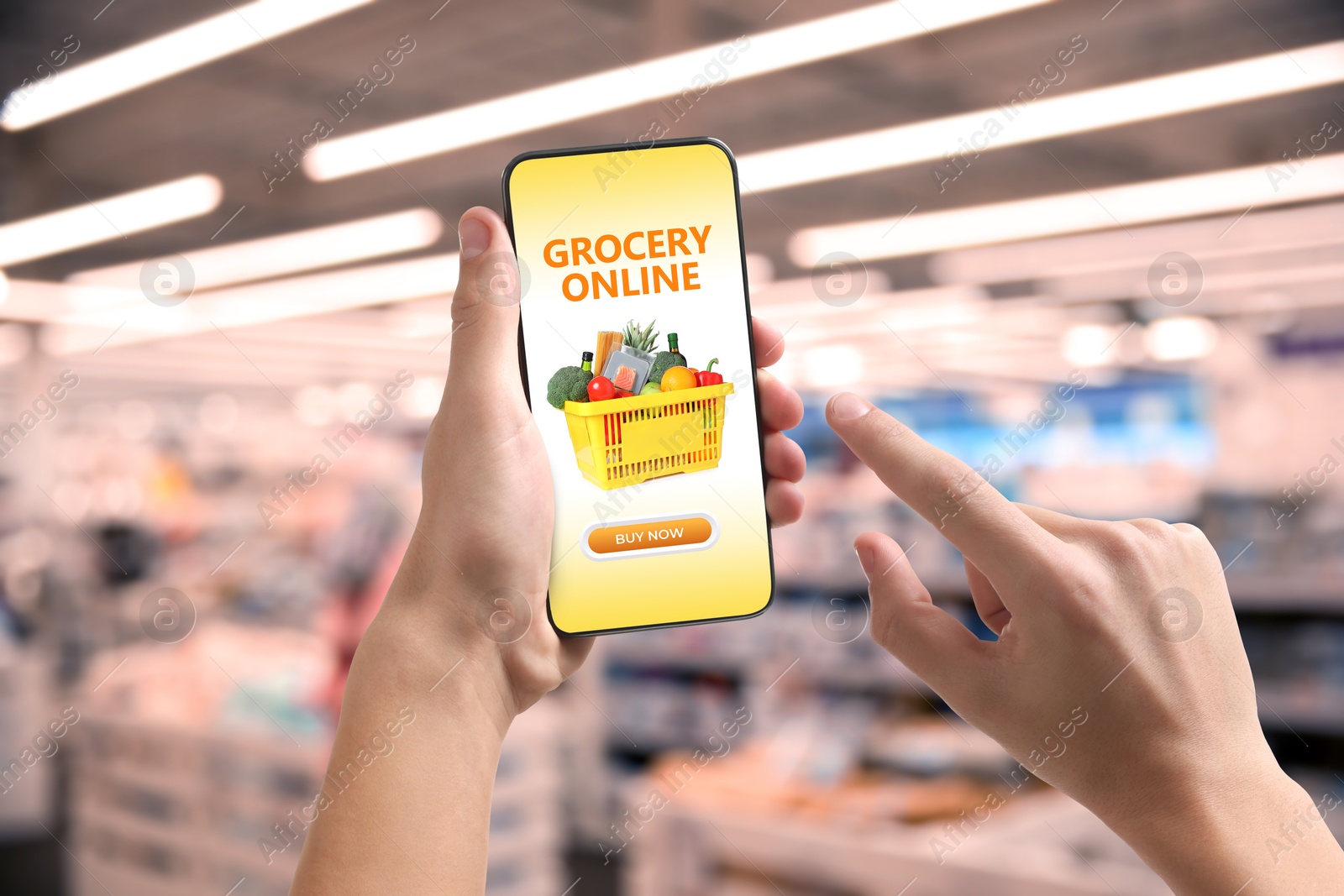 Food delivery. Man using mobile phone app to order grocery online, closeup Image of Food delivery. Man using mobile phone app to order grocery online, closeup