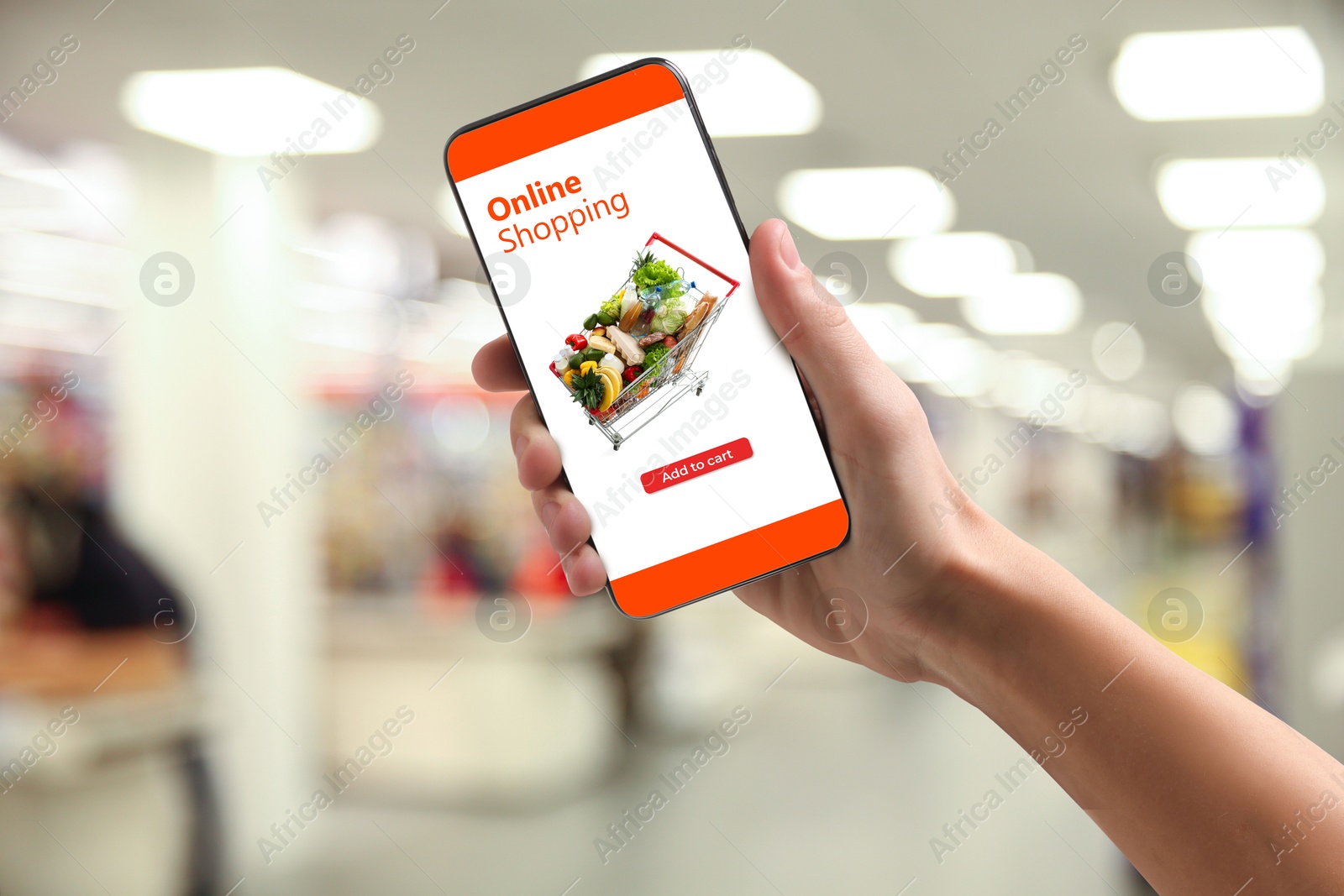 Food delivery. Man using mobile phone app to order grocery online, closeup Image of Food delivery. Man using mobile phone app to order grocery online, closeup