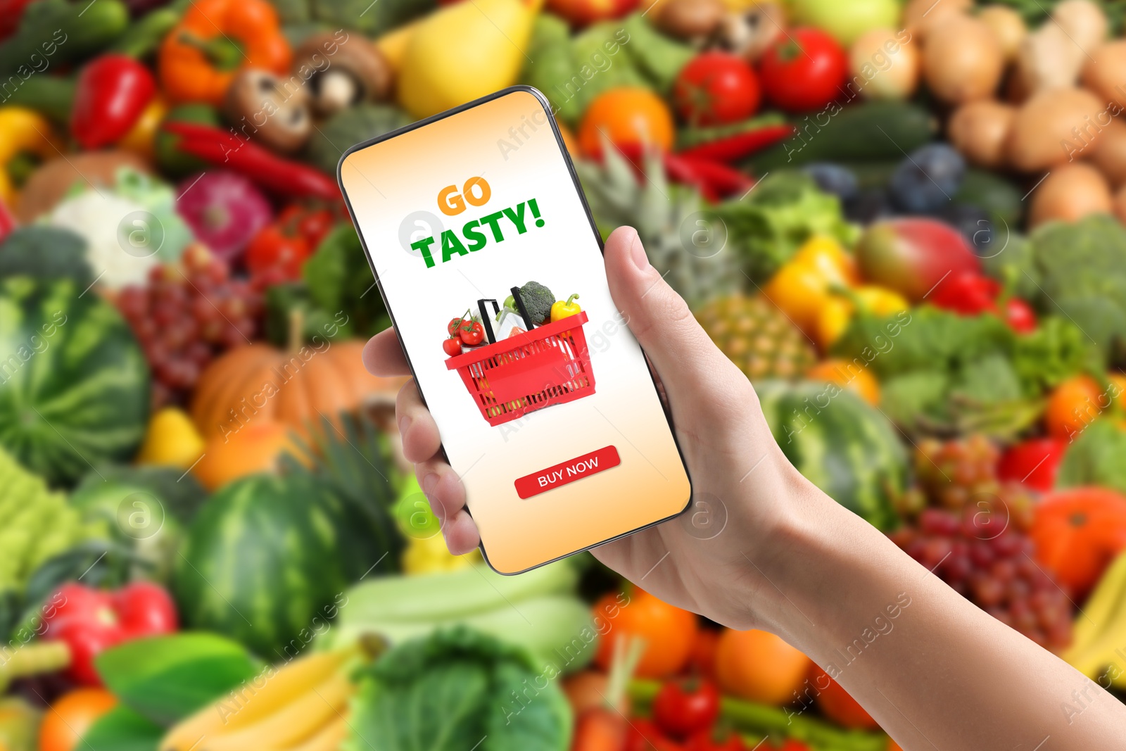 Food delivery. Man using mobile phone app to order grocery online, closeup Image of Food delivery. Man using mobile phone app to order grocery online, closeup
