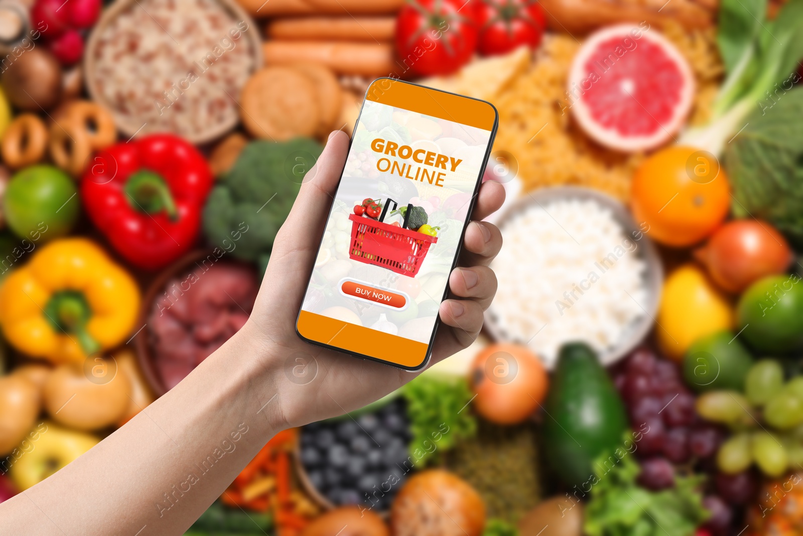 Food delivery. Man using mobile phone app to order grocery online, closeup Image of Food delivery. Man using mobile phone app to order grocery online, closeup