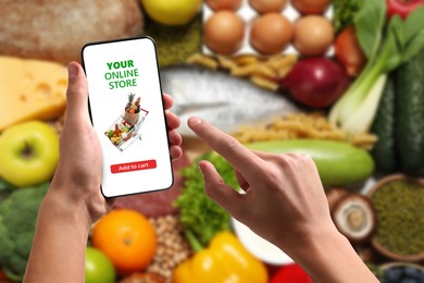 Image of Food delivery. Man using mobile phone app to order grocery online, closeup