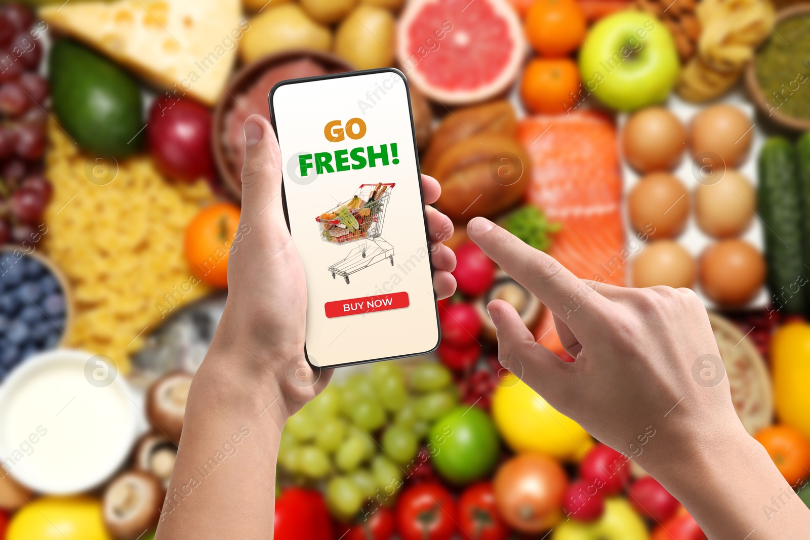 Food delivery. Man using mobile phone app to order grocery online, closeup Image of Food delivery. Man using mobile phone app to order grocery online, closeup