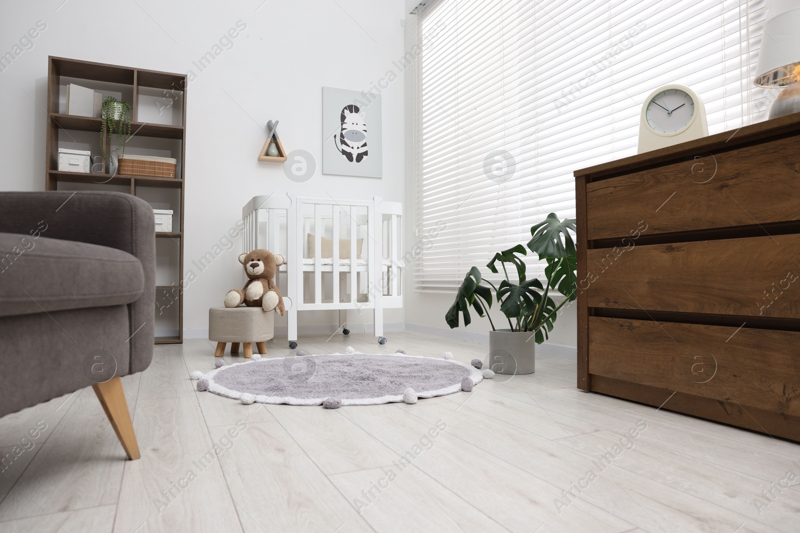 Baby's room with stylish furniture. Interior design Photo of Baby's room with stylish furniture. Interior design