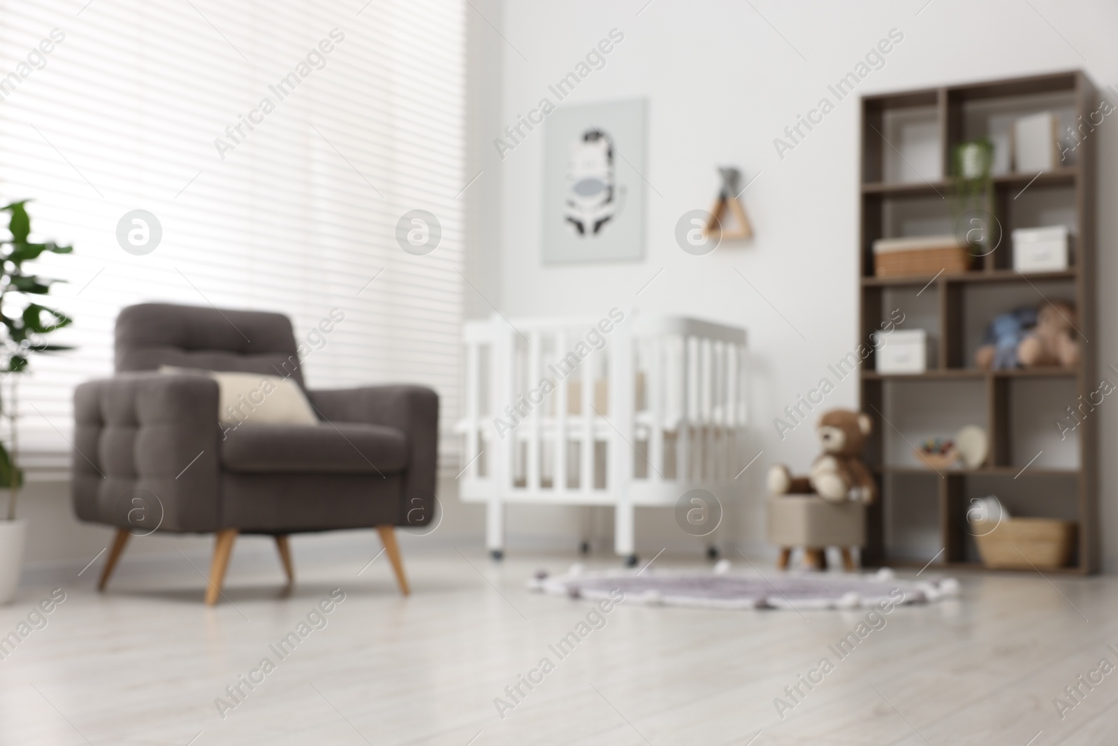 Photo of Blurred view of baby's room. Interior design
