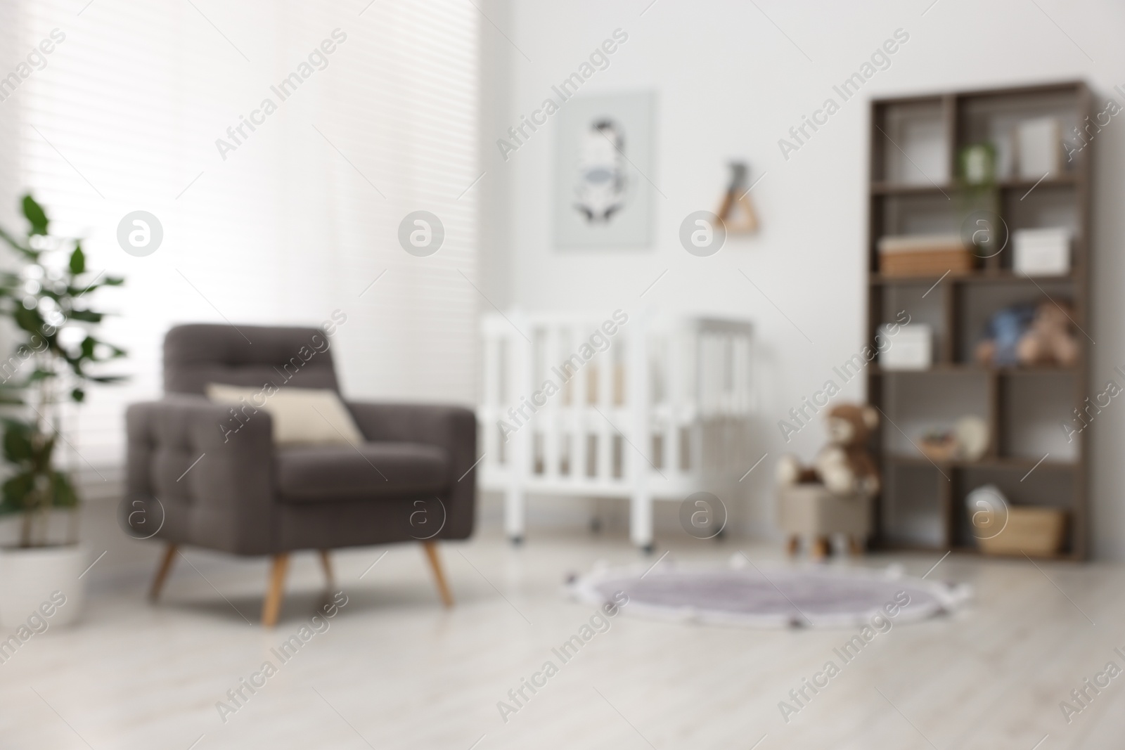 Photo of Blurred view of baby's room. Interior design