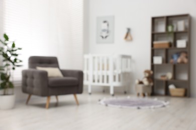Photo of Blurred view of baby's room. Interior design
