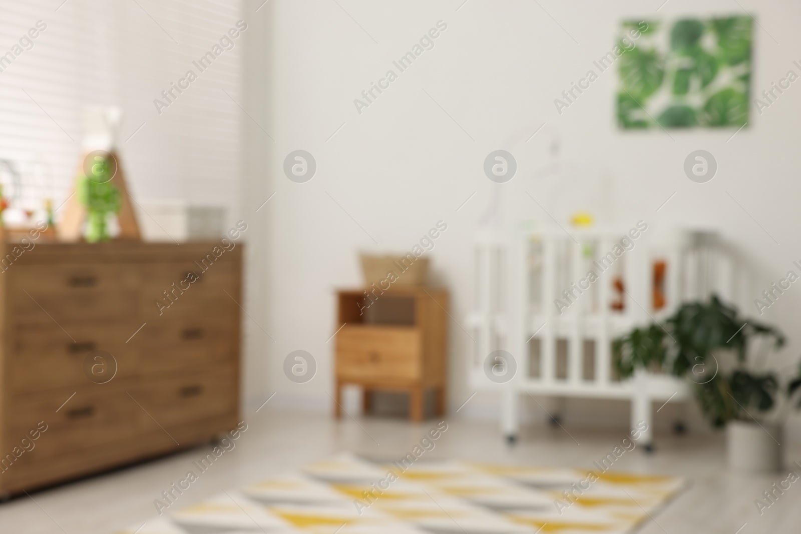 Photo of Blurred view of baby's room. Interior design