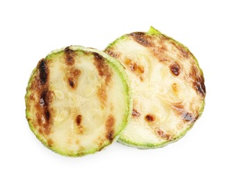 Photo of Delicious grilled courgette slices isolated on white, top view