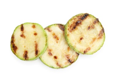 Photo of Delicious grilled courgette slices isolated on white, top view