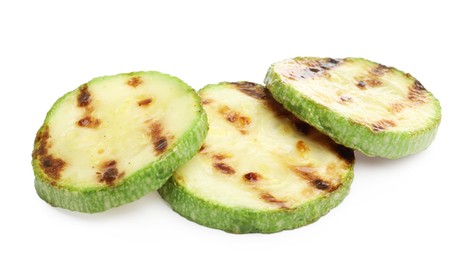 Photo of Delicious grilled courgette slices isolated on white