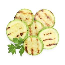 Photo of Delicious grilled courgette slices with parsley isolated on white, top view