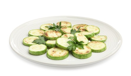 Photo of Delicious fried courgette slices with parsley isolated on white