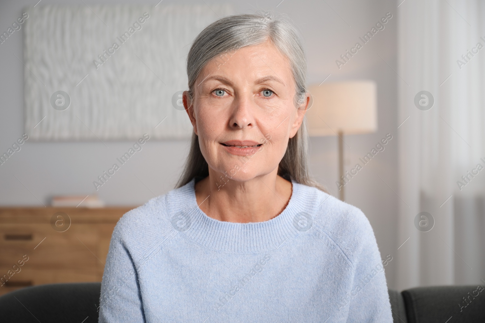 Photo of Portrait of elegant senior woman at home