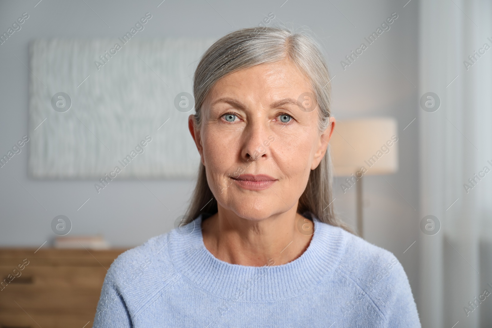 Photo of Portrait of elegant senior woman at home