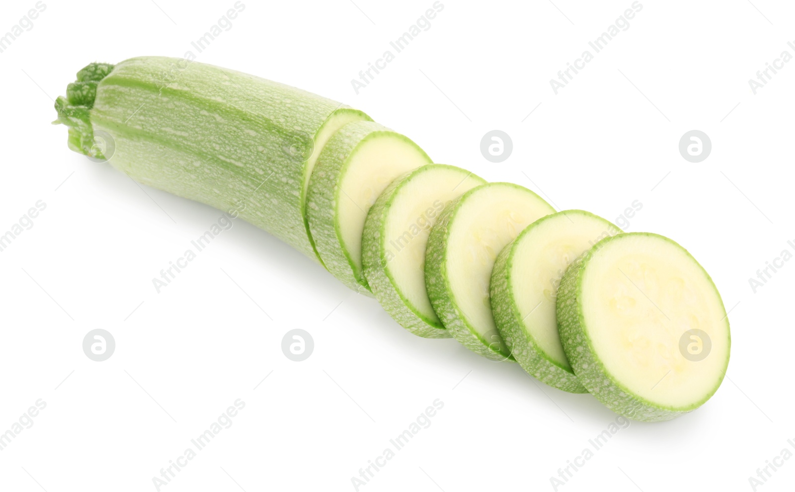 One fresh cut zucchini isolated on white Photo of One fresh cut zucchini isolated on white