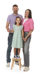Photo of Lovely family posing together on white background