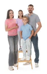 Photo of Lovely family posing together on white background
