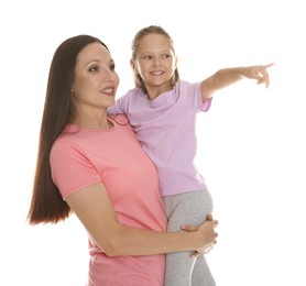 Photo of Daughter showing her mother something on white background