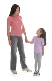 Photo of Mother and daughter posing together on white background