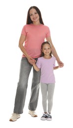 Photo of Mother and daughter posing together on white background