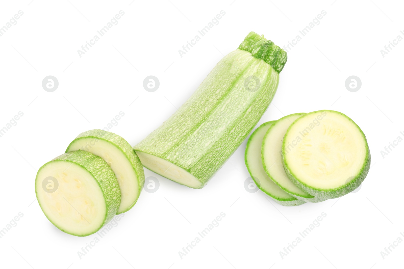 Photo of Fresh cut zucchini isolated on white, top view