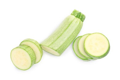 Photo of Fresh cut zucchini isolated on white, top view