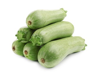 Photo of Many fresh ripe zucchinis isolated on white