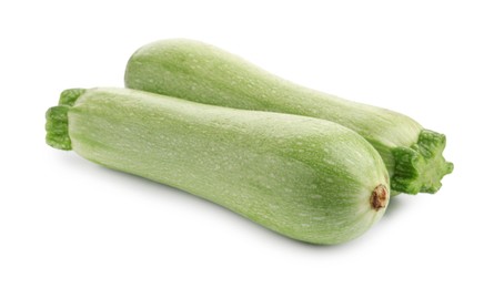 Photo of Two fresh ripe zucchinis isolated on white