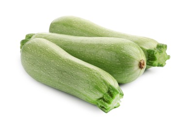 Photo of Many fresh ripe zucchinis isolated on white